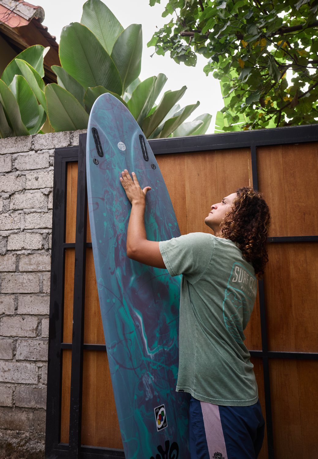Franco with a teal resin board at the gate